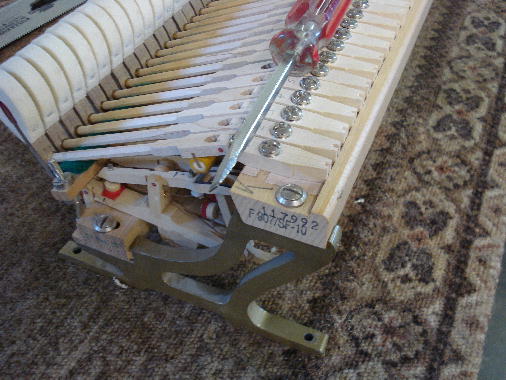 26 Tighten bracket screws 26 Tighten bracket screws